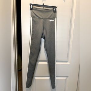 Adidas Grey Leggings with Signature Triple Stripe down the side.